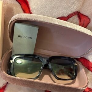 Miu Miu Black and Gold Sunglasses with Case